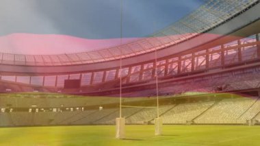 Bir spor stadyumu önünde bir üfleme Alman bayrağı animasyon