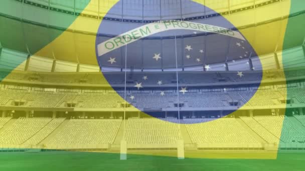 Animacja Dmuchanie Brazylijskiej Flagi Przed Stadionem Sportowym — Wideo stockowe