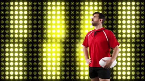 Animation Caucasian Male Rugby Player Holding Ball Looking Digital Display — Stock Video