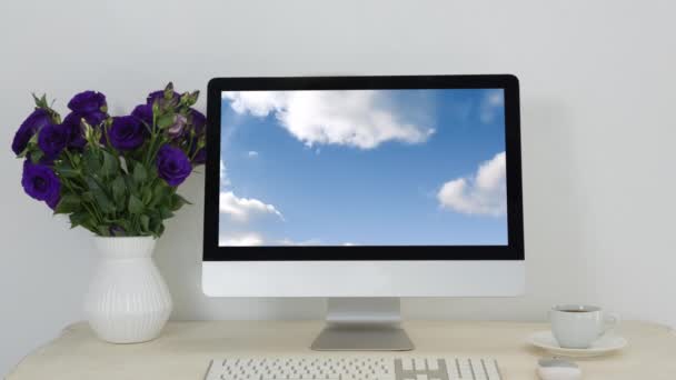 Animation Blue Sky Clouds Displayed Computer Monitor Keyboard Coffee Cup — Stock Video