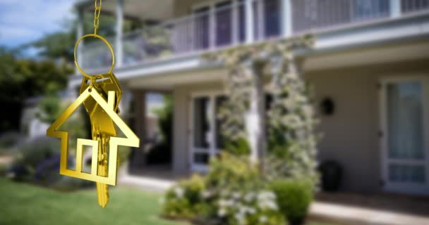 Animáció a Golden House kulcsok és a ház alakú kulcstartó lógott egy fókuszban ház 4k