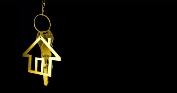 Animatie Van Gouden Huissleutels Huis Vormige Sleutelhanger Opknoping Een Zwarte — Stockvideo