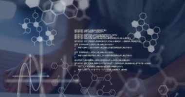Animation of scientific data in white floating in the foreground with a close up of a young mixed race woman wearing a VR headset, using a tablet and smiling in the background 4k