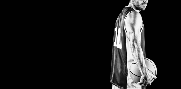 在黑色背景上隔离的篮球运动员 — 图库照片