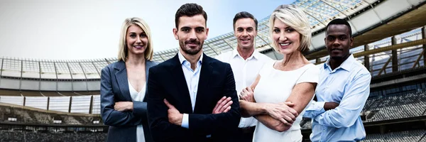 Confident Business People Arms Crossed Standing White Background Rugby Stadium — Stock Photo, Image