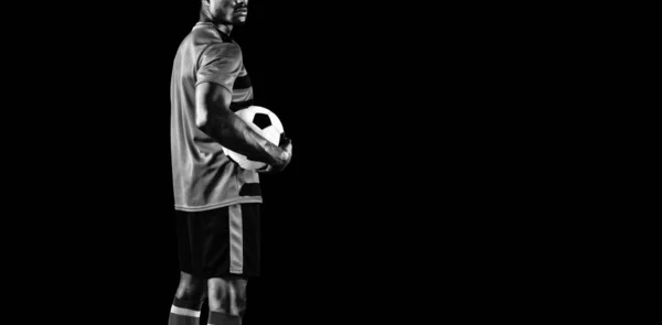 Focused Soccer Player Isolated Black Background — Stock Photo, Image