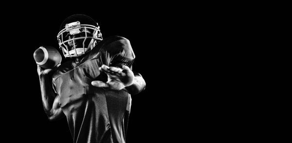 Strong Rugby Player isolated on black background