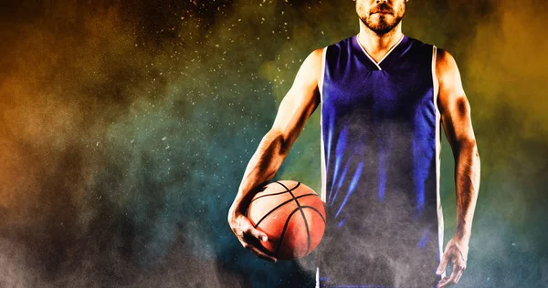 黄色の色の粉末の飛散に対するバスケットボール選手 — ストック写真