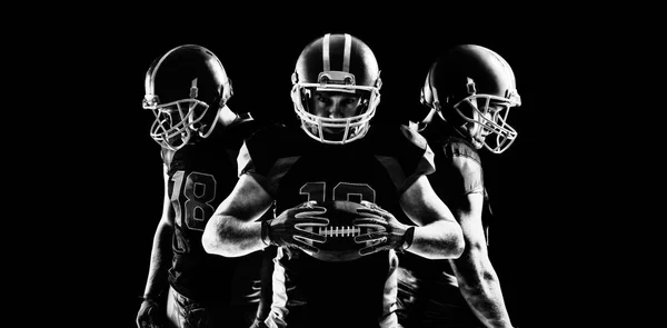 Young American Football Players Helmets Standing Looking — Stockfoto