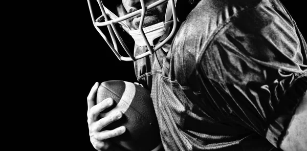 American Football Player isolated on black background