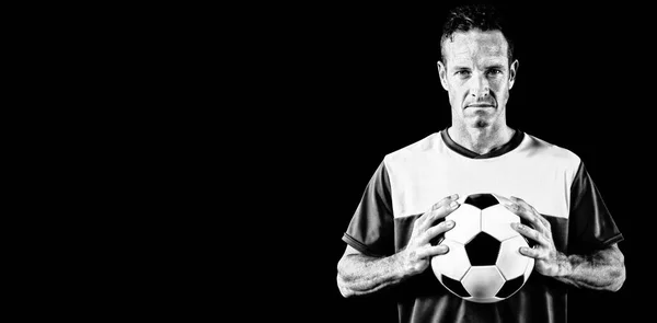 Focused Soccer Player Isolated Black Background Stock Image