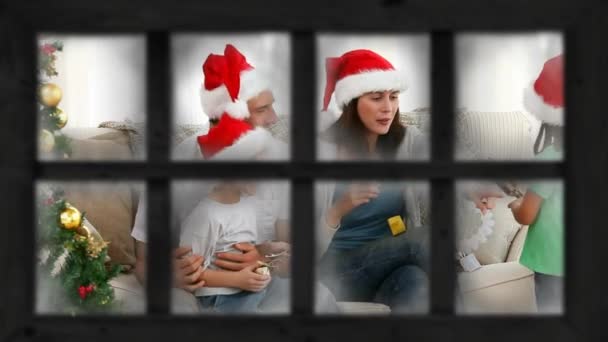 圣诞树下透过窗户看到的一家人互相送礼的情景 — 图库视频影像