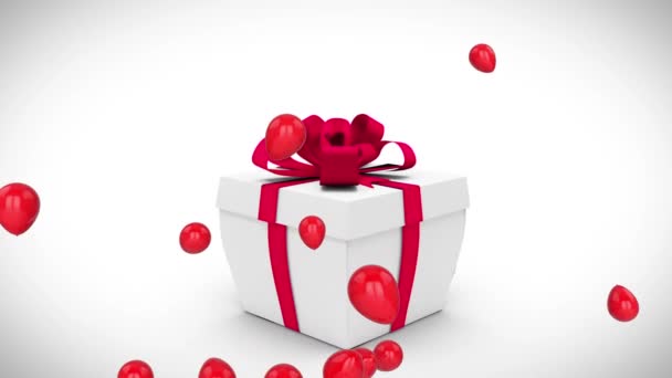 用红色缎带从白色礼品盒里蹦出五彩缤纷的信件 在白色的背景上漂浮着闪闪发亮的红色气球 生日快乐 这几个字增添了生气 — 图库视频影像