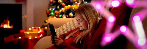 Side View Young Caucasian Girl Using Tablet Sitting Room Christmas — Stock Photo, Image