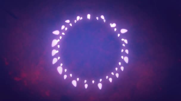 用紫色背景上明亮的仙女灯环行圣诞装饰的动画 — 图库视频影像