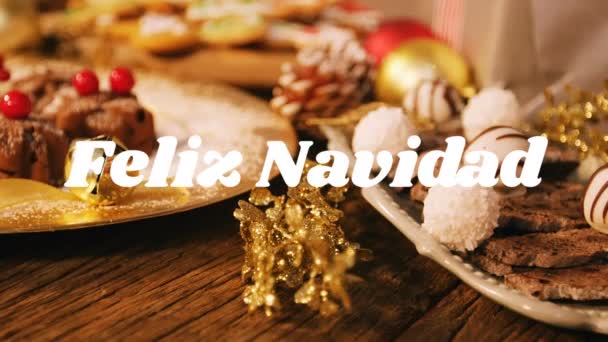 Animacja Słów Feliz Navidad Napisana Biało Dekoracjami Świątecznymi Ciasteczkami Tle — Wideo stockowe