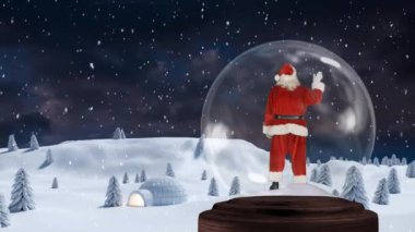 Noel Baba 'nın dikiz aynasının canlandırması. Kar küresi üzerinde duruyor ve sallanıyor. Kırsal bir alana kar yağıyor ve arka planda gece gökyüzü var.