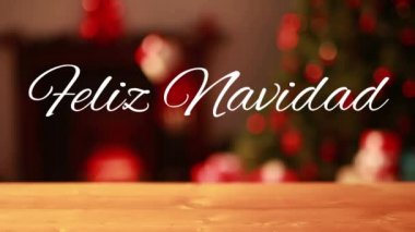 Arka planda yanıp sönen ışıklar üzerine beyaz harflerle yazılmış Feliz Navidad kelimelerinin animasyonu