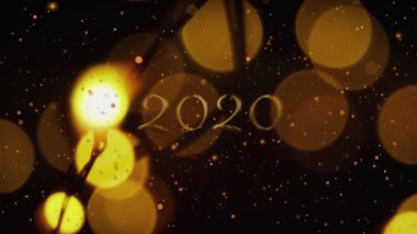 2020 sayısının altın harflerle animasyonu ve arka planda ışık lekeleri