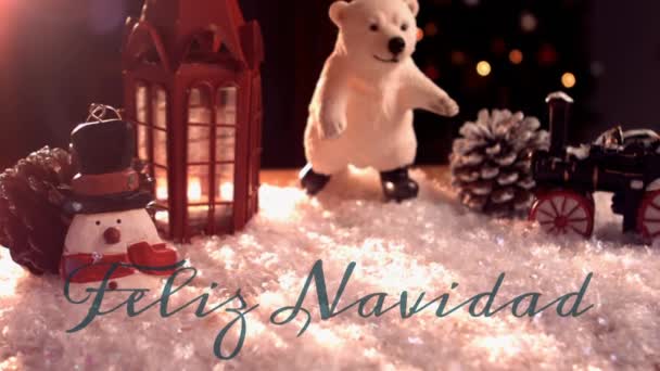 背景にクリスマスの装飾と緑で書かれた言葉Feliz Navidadのアニメーション — ストック動画