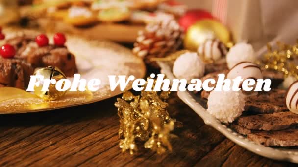 Animacja Słów Frohe Weihnachten Napisana Biało Dekoracjami Świątecznymi Ciasteczkami Tle — Wideo stockowe