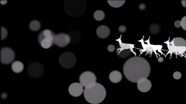 Kızak içindeki beyaz bir Noel Baba siluetinin animasyonu siyah arka planda parıldayan beyaz ışık lekeleri olan ren geyikleri tarafından çekiliyor.