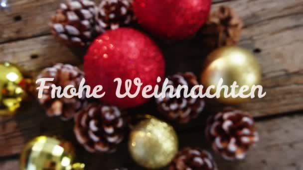 Arka Planda Noel Süslemeleri Üzerine Beyazla Yazılmış Frohe Weihnachten Kelimelerinin — Stok video