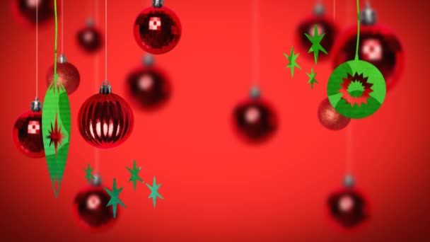 Kırmızı Arkaplanda Odağını Kaybetmiş Mücevherlerin Önünde Yeşille Çizilmiş Noel Mücevherleriyle — Stok video