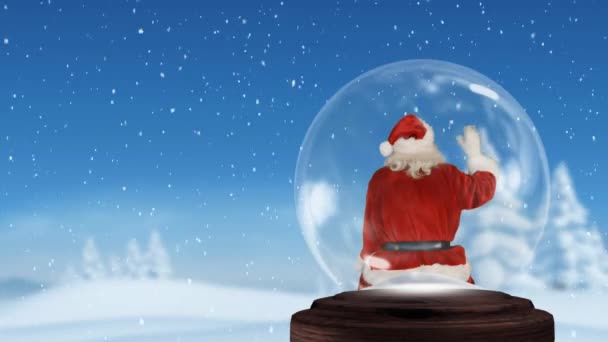 Animation Rear View Santa Claus Sitting Waving Snow Globe Snow — Stock Video