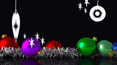 Mutlu Noeller beyaz harflerle yazılmış Noel süsleri bembeyaz çizilmiş renkli Noel mücevherlerinin önünde.