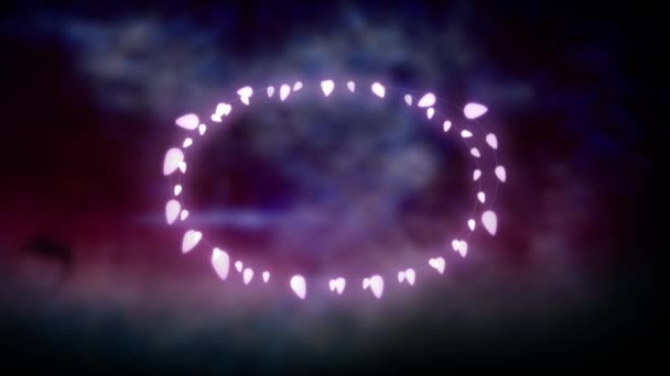 在紫色的背景上 用椭圆形的闪光的神灯来动画圣诞装饰品 — 图库视频影像