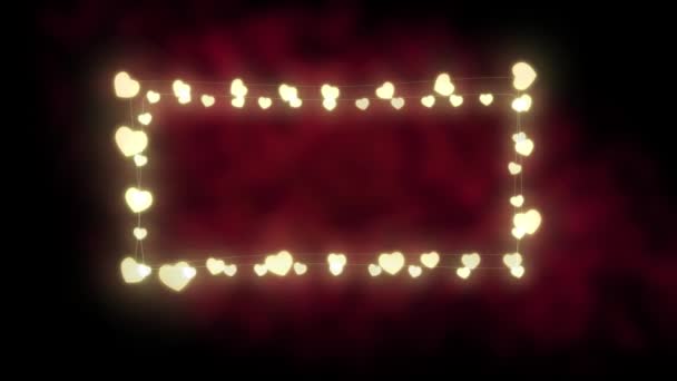 Koyu Turuncu Arka Planda Parlayan Kalp Şeklindeki Peri Işıklarının Dikdörtgen — Stok video