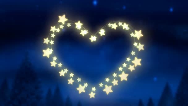 青い背景に輝く星型の妖精の光の中心を持つクリスマスの装飾のアニメーション — ストック動画