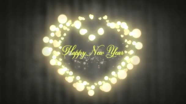言葉のアニメーション灰色の背景に輝く妖精の光のハート型のフレームに黄色の文字でハッピー新年 — ストック動画