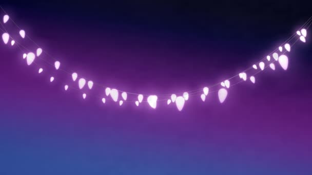 用紫色背景上一串串闪亮的神灯作圣诞装饰的动画 — 图库视频影像