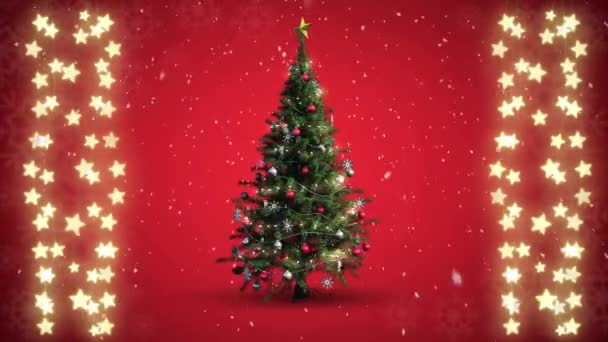 回転するクリスマスツリーと赤い背景に輝く星型の妖精の光の文字列のアニメーション — ストック動画