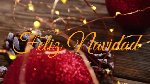 Animación Las Palabras Feliz Navidad Escritas Naranja Sobre Adornos Navideños — Vídeos de Stock