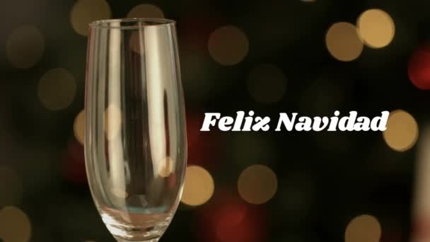 Animazione Delle Parole Feliz Navidad Scritte Bianco Con Champagne Versato — Video Stock