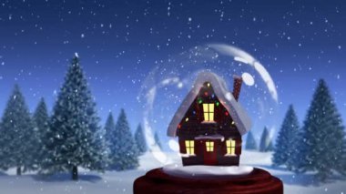 Karla kaplı bir kır evinin animasyonu, üzerinde Noel ışıkları olan bir kar küresi, ağaçlı bir kır manzarası ve arka planda mavi bir gökyüzüne düşen kar.