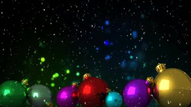 Yüzen simlerin animasyonu ve siyah arkaplanda takılar olan Noel süslemeleri