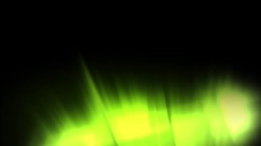 Siyah arkaplanda parlayan yeşil ve sarı ışık izlerinin canlandırması