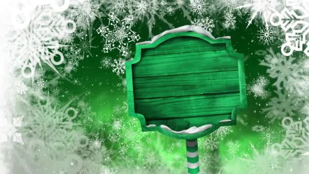 Animación Copos Nieve Cayendo Letrero Madera Verde Sobre Fondo Verde — Vídeo de stock