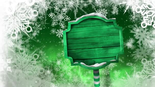 Animación Copos Nieve Cayendo Letrero Madera Verde Sobre Fondo Verde — Vídeos de Stock