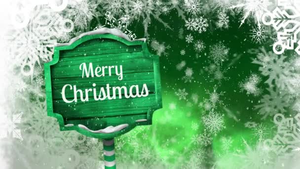 Animace Slov Veselé Vánoce Napsané Bíle Zelené Dřevěné Tabuli Sněhovými — Stock video