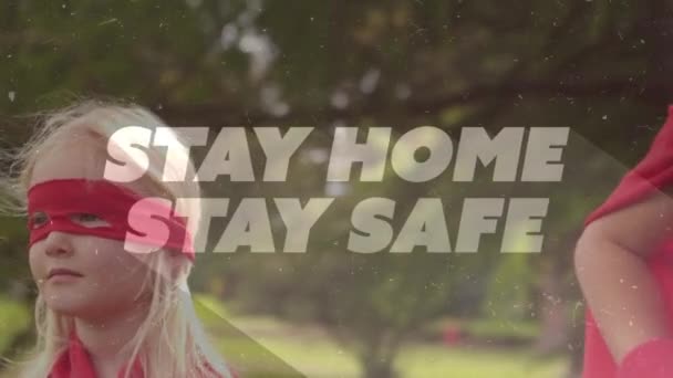 Animation Text Stay Home Stay Safe Caucasian Boy Φορώντας Κάπα — Αρχείο Βίντεο