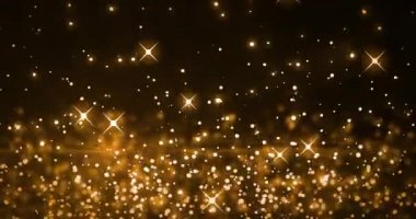 Kahverengi arka planda hipnotik hareketle hareket eden birden fazla parıldayan altın ışık noktasının animasyonu. Işık ve hareket kavramı dijital olarak oluşturuldu.