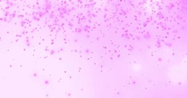 Pembe arka planda hipnotik hareketle hareket eden birden fazla parlak pembe ışık noktasının animasyonu. Işık ve hareket kavramı dijital olarak oluşturuldu.