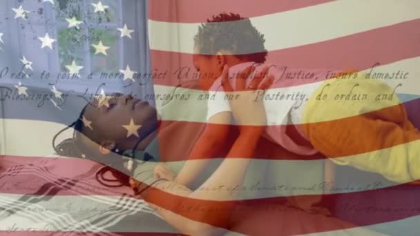 Animation Flag Waving Constitution Text Rolling African American Woman Playing — Stock Video