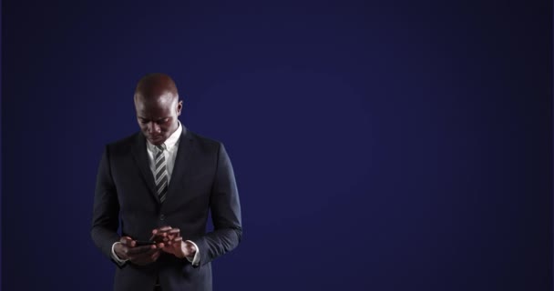 Animation African American Man Using Smartphone Emojis Floating Blue Background — Stock Video