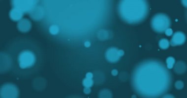 Mavi arka planda hipnotik hareketle hareket eden mavi parlak ışık noktalarının animasyonu. Işık ve hareket kavramı dijital olarak oluşturuldu.